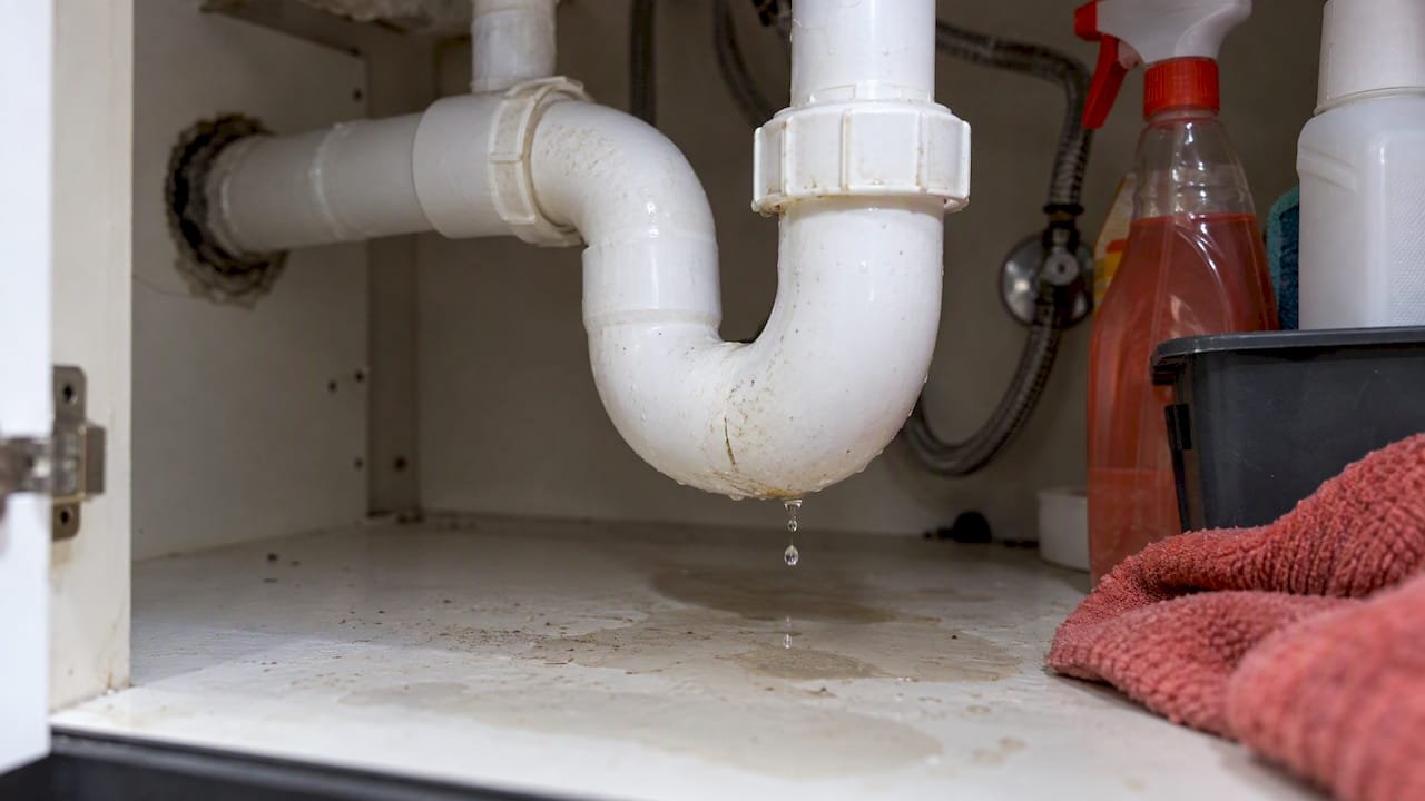 Slow leak beneath a kitchen sink