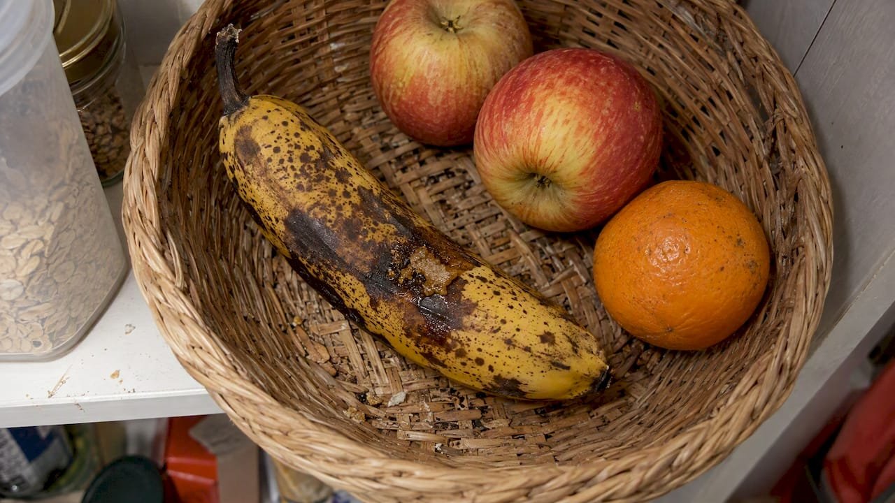 Overripe banana in a pantry fruit bowl